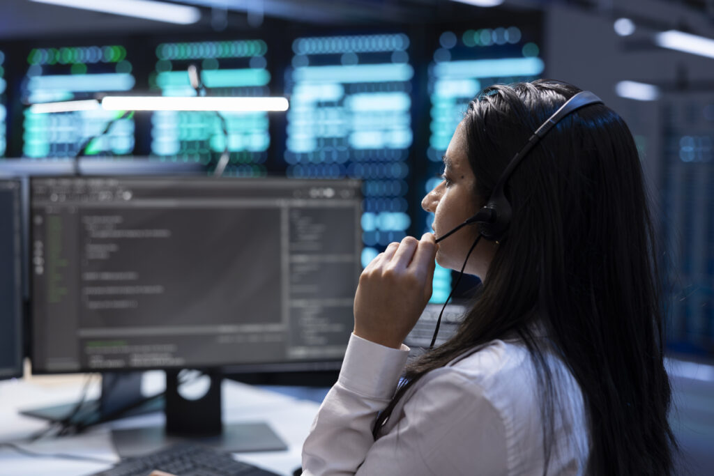 Data center support specialist performing systems integration activities, supporting engineering team doing hardware maintenance. Employee in server hub coordinating technicians