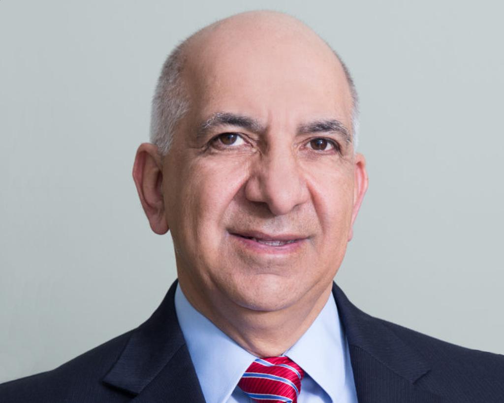 Image of Jamshid Smiling at the Camera